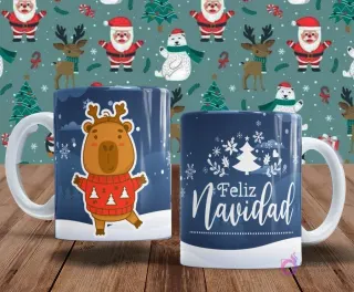 Dos tazas de sublimación con temática de capibaras y Navidad. Una taza presenta un capibara con un suéter navideño rojo bailando. La otra taza dice 'Feliz Navidad' con un árbol de nieve y copos.