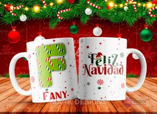 Taza sublimada con la letra F mayúscula en verde y blanco con patrones de bastones de caramelo, junto al nombre 'FANY' y al reverso 'Feliz Navidad' con estrellas y copos de nieve.