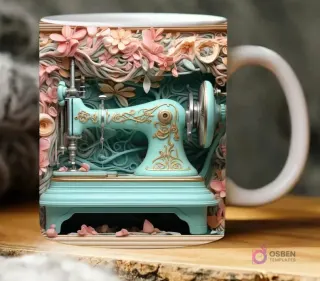 Taza sublimada con máquina de coser 3D color menta y detalles dorados, rodeada de delicadas flores y hojas rosadas.