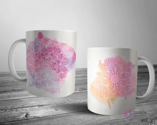 Dos tazas blancas con un diseño de mandala de contorno blanco sobre un fondo de cálidas manchas de acuarela en rosa, morado y naranja.