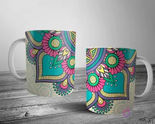 Dos tazas blancas con un alegre diseño de mandala floral y geométrico en teal, rosa, morado y amarillo, sobre un fondo beige claro.
