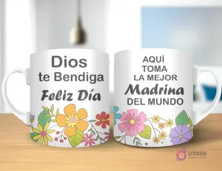 Taza de sublimación con diseño floral, texto 'Dios te Bendiga Feliz Día' y 'AQUÍ TOMA LA MEJOR Madrina DEL MUNDO' con asa blanca.