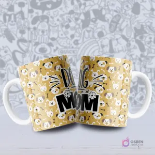 Tazas blancas sublimadas con un patrón de caras de perros en tonos amarillos y blancos, con huesos pequeños, y la frase 'DOG MOM'.