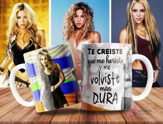 Taza de sublimación blanca y naranja con diseño de Shakira y frase 'Te creíste que me heriste y me volviste más DURA' en tonos grises