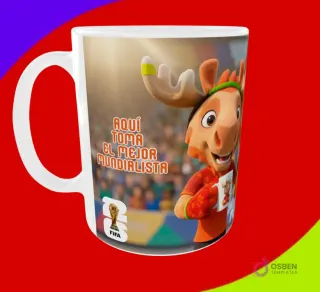 Diseño de taza para sublimar con la mascota alce y la frase 'Aquí toma el mejor mundialista' y logo 26 FIFA