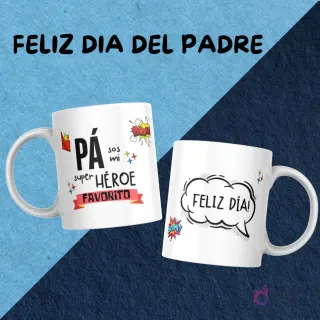 Dos tazas con diseños estilo cómic para el Día del Padre: 'Pá sos mi super héroe favorito' con efectos de explosión y la otra con 'Feliz día!' en una burbuja de diálogo.
