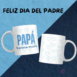 Tazas blancas con un diseño de sublimación 'Papá te quiero mucho' en color azul, rodeado de pequeños corazones de contorno azul.
