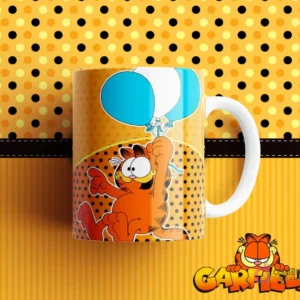 Taza de sublimación con diseño de Garfield feliz, sujetando dos globos azules y blancos. Fondo amarillo con lunares y rayas.