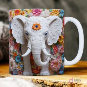 Taza sublimada con elefante blanco 3D decorado con patrones y acentos azules/naranjas, inmerso en un jardín de flores de colores.