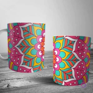 Dos tazas blancas con un diseño de mandala brillante y dinámico en rosa, teal, naranja y amarillo, creando un patrón simétrico y energético.