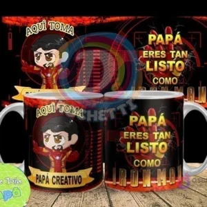 Mockup de dos tazas sublimadas con diseño de Iron Man, una dice 'Aquí Toma Papá Creativo' y la otra 'Papá Eres Tan Listo Como Iron-Man'. El fondo rojo con elementos tecnológicos y una pancarta superior complementa el diseño.