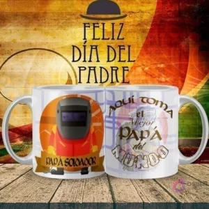 Tazas sublimadas con temática del Día del Padre, una con la figura de un papá soldador con máscara y soplete, y la otra con un diseño de máscara de soldar y 'Aquí toma el Mejor Papá del Mundo', en un ambiente de Feliz Día del Padre.