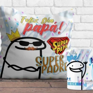 Cojín y taza sublimados con diseños Flork del Día del Padre. El cojín muestra un Flork con corona y gafas y el texto 'Feliz Día Papá! Súper Papá', mientras la taza tiene un Flork levantando la mano con el logo de Unión Española.