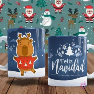 Dos tazas de sublimación con temática de capibaras y Navidad. Una taza presenta un capibara con un suéter navideño rojo bailando. La otra taza dice 'Feliz Navidad' con un árbol de nieve y copos.