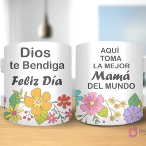 Taza de sublimación con diseño floral, texto 'Dios te Bendiga Feliz Día' y 'AQUÍ TOMA LA MEJOR Mamá DEL MUNDO' con asa blanca.
