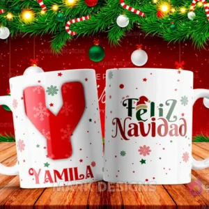 Taza sublimada con la letra Y mayúscula en rojo adornada con copos de nieve, junto al nombre 'YAMILA' y al reverso 'Feliz Navidad' con estrellas y copos de nieve.